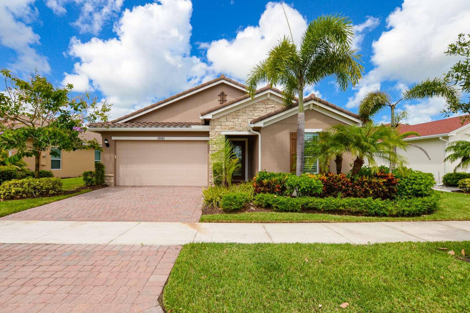 This ''Estero'' model home features a modern open floor plan, with 2 bedrooms and a versatile den that can serve as a bedroom or office.