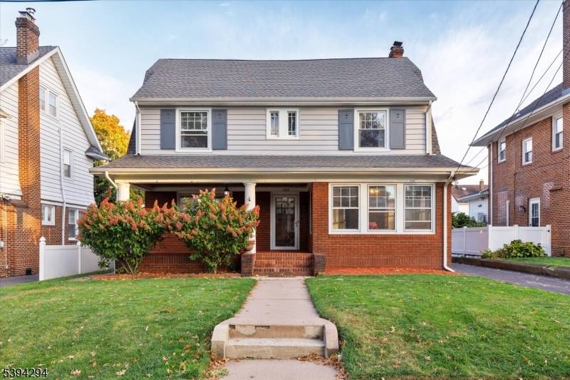 Welcome to 133 Mortimer Ave a timeless brick and siding Colonial full of warmth and character, set on a picture perfect block just moments from Rutherford's vibrant downtown.