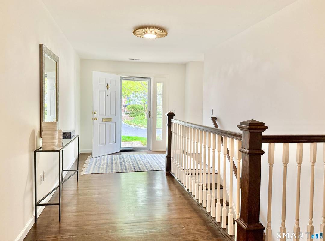 The ever popular Leefair condo complex is the setting of this delightful and renovated end unit.