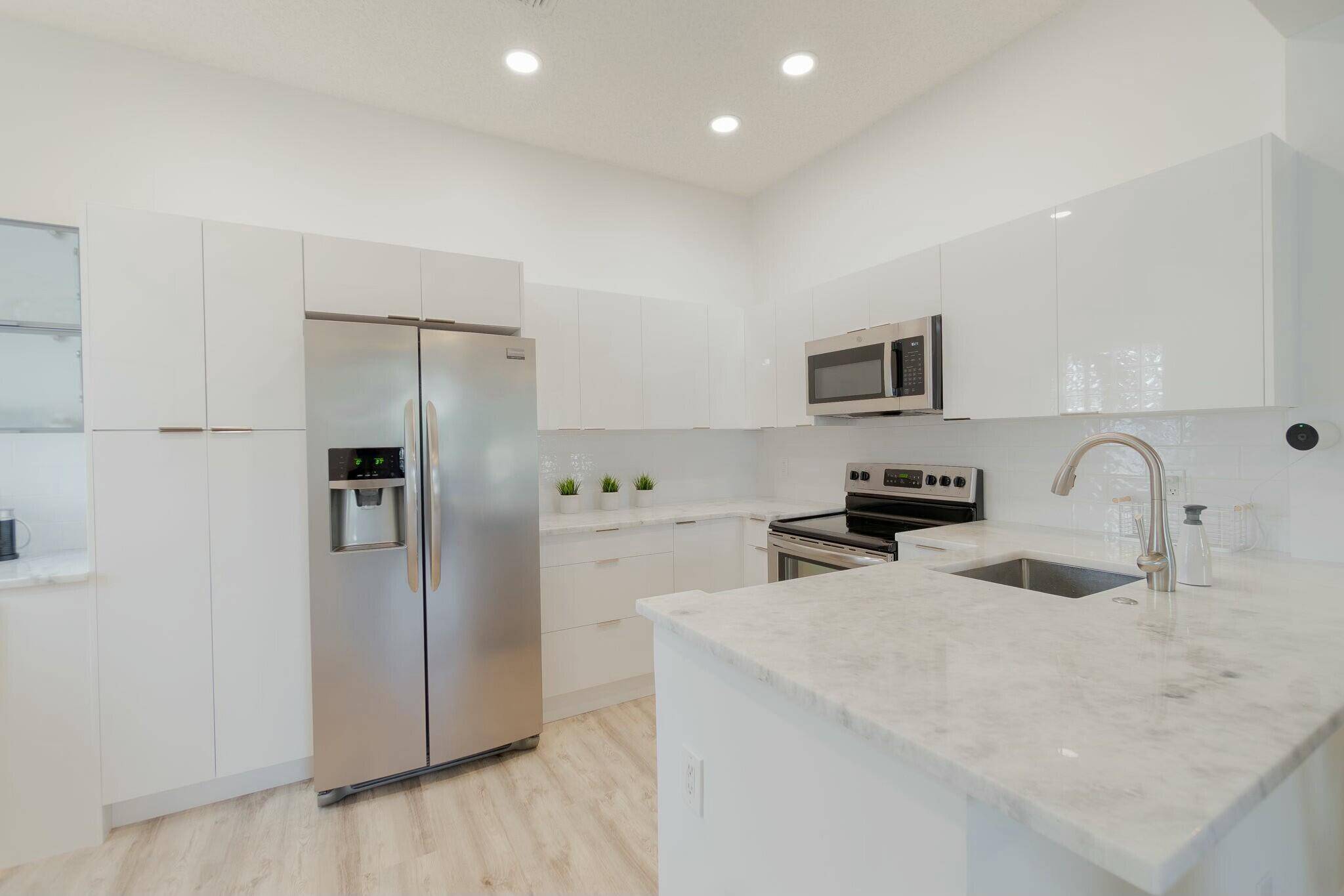 Turnkey Renovated Corner Unit in the Resort Style Community of Platina !