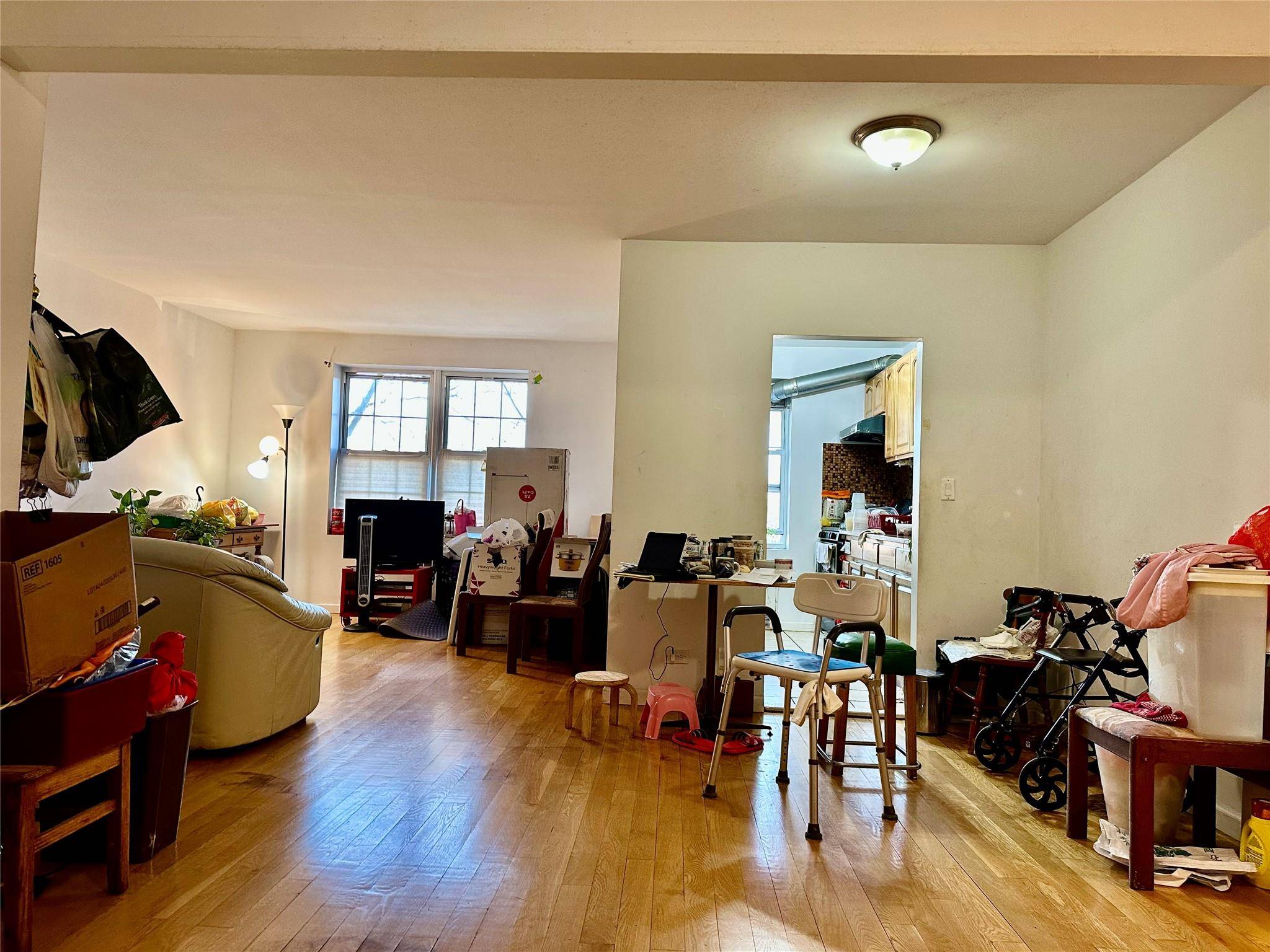 PRICE REDUCTTION gt ; Envision a 2 bedroom condo with 1041 sqft, living and dining room, and a functional kitchen, hardwood floors, numerous windows, and granite countertops.