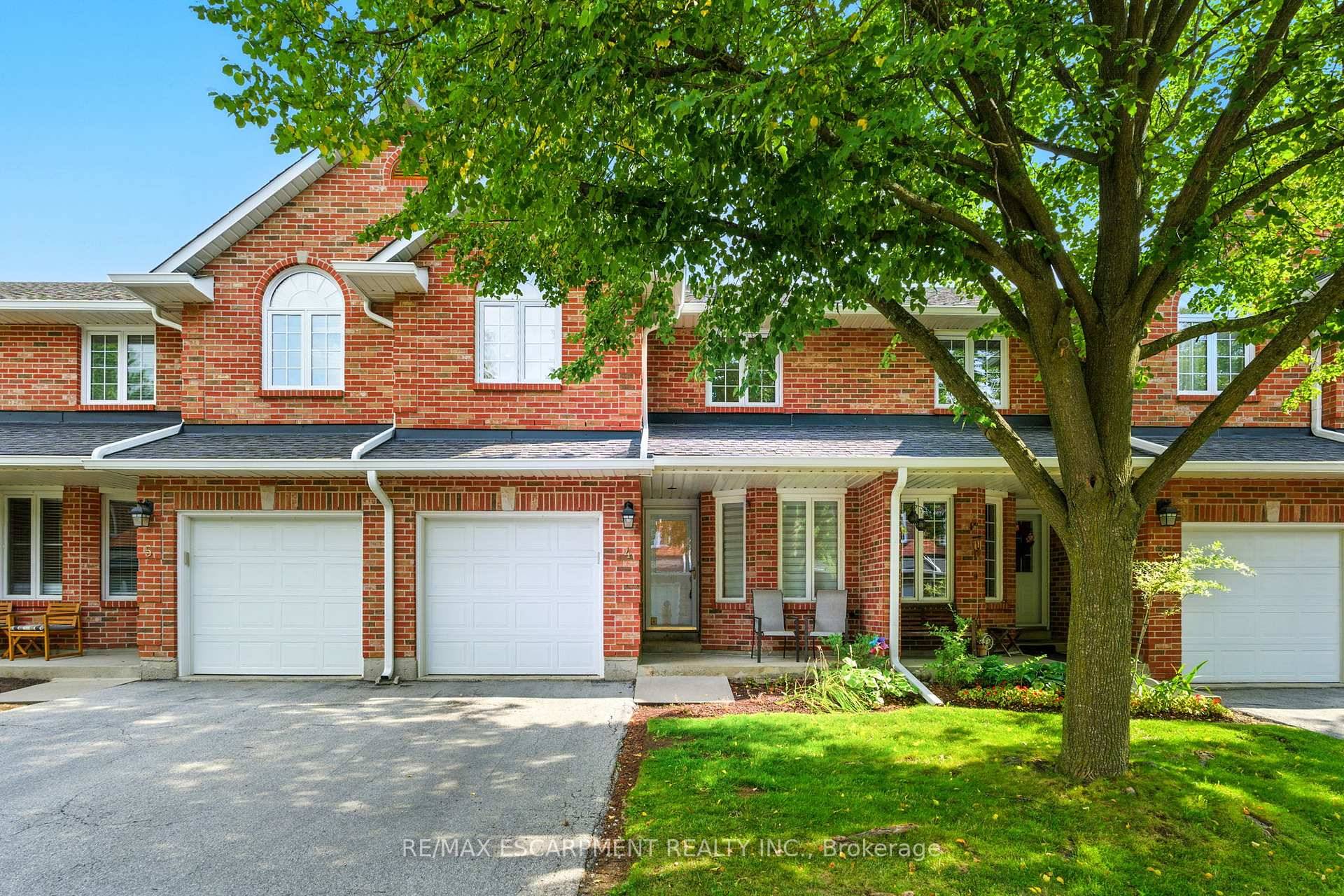 This beautifully updated condo townhome is located in a highly sought after small enclave of homes situated in Burlington's Headon Forest community.
