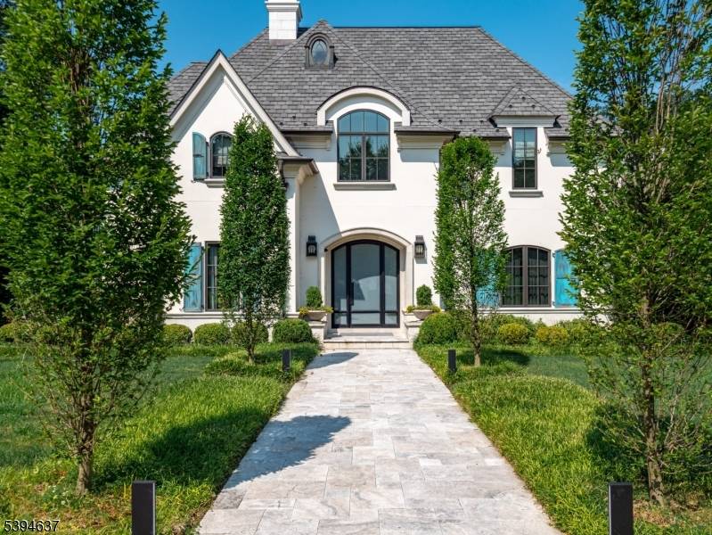 A timeless French inspired estate set on two manicured acres in one of Old Tappan ?