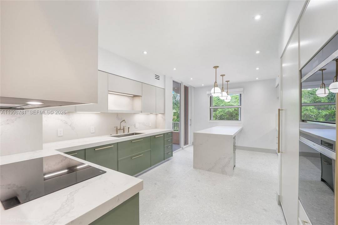 Absolutely stunning two bedroom unit located at the sought out Ocean Club in Key Biscayne.
