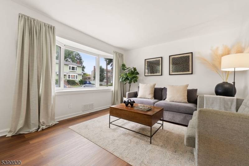 Charming Cape Cod home in sought after Nutley, thoughtfully designed to maximize comfort, light, and functionality.