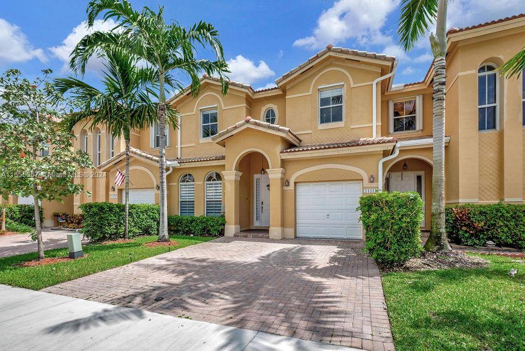 Beautiful and oversized 4 bedroom townhouse in the sought out neighborhood of Kendall Breeze West.