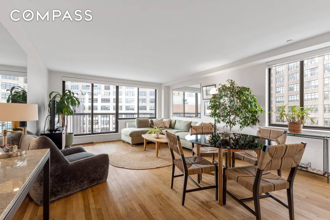 Welcome to this bright, spacious, and tranquil high floor corner residence at 63 Downing Street, complete with a private balcony and city views.