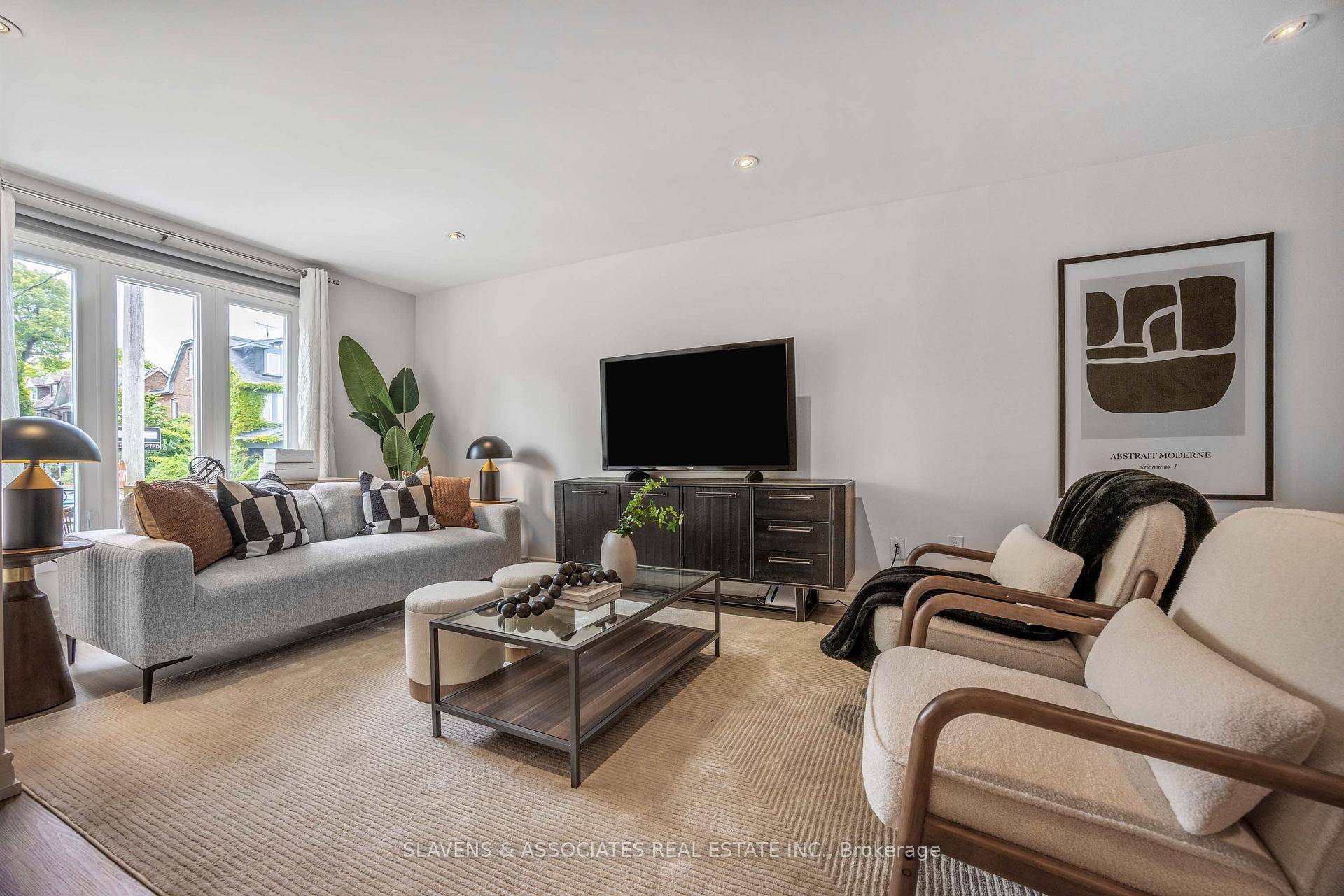 Welcome to this spacious 4 1 Bedroom contemporary home, tucked away on a quiet street just steps from the best of Bloor and Christie Pits.