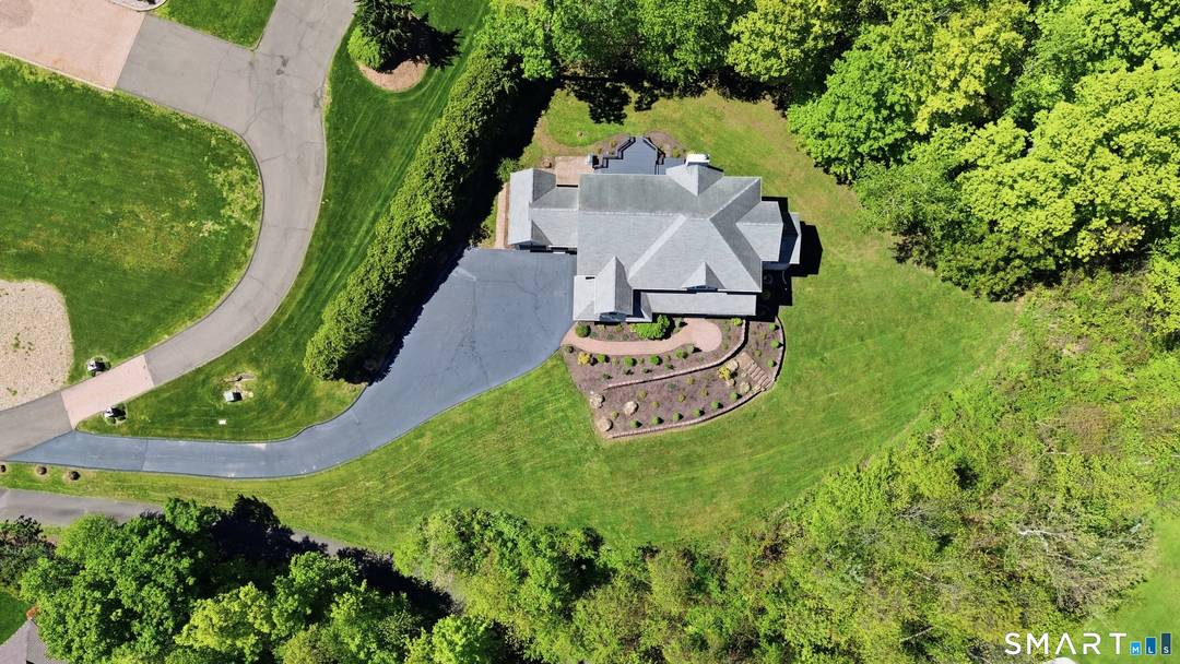 Set on a private. 95 acre lot backing to the MDC reservoir, this 2001 built Colonial west of Mountain Road offers space, function, and a prime location minutes from Bishop's ...