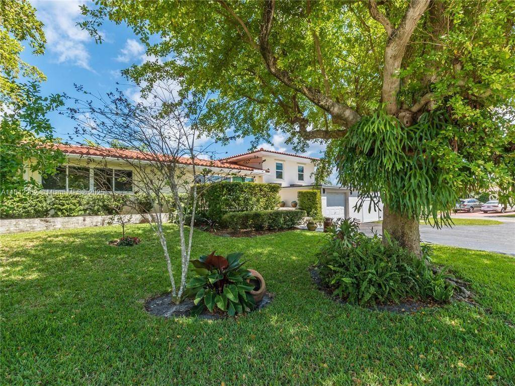Welcome to this charming 4 bed, 3 bath corner home nestled deep in Lighthouse Point near the marina.