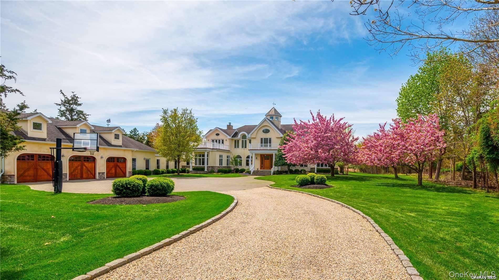 Escape to a serene 4. 74 acre waterfront haven in Center Moriches.