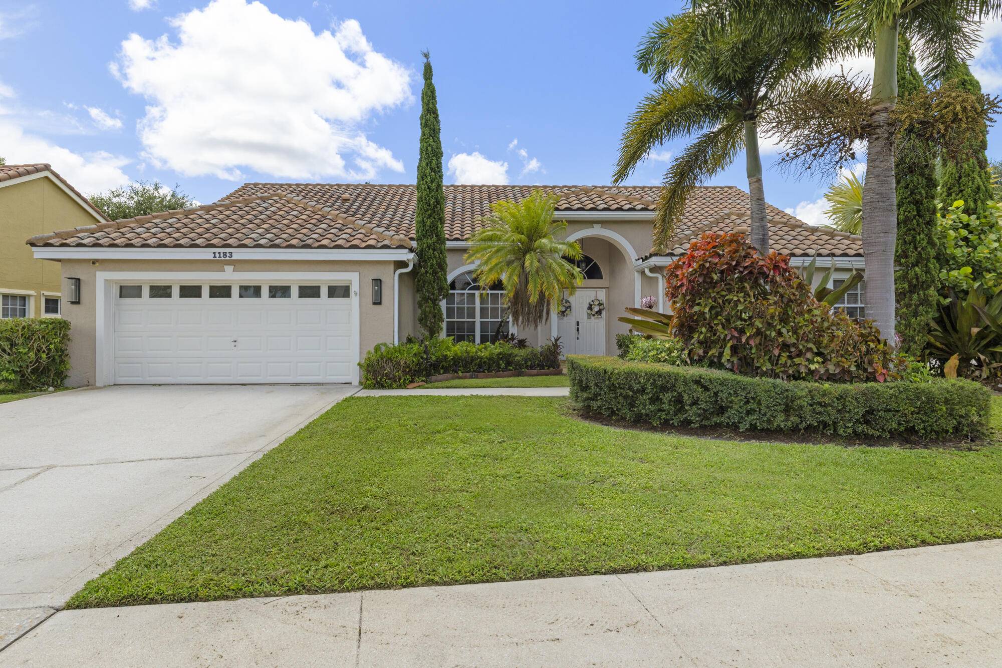 Enjoy the perfect blend of comfort, style, and South Florida living in this beautifully maintained pool home in Wellington's Emerald Forest.