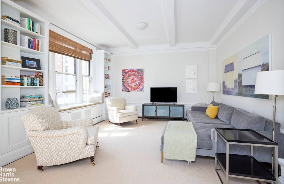 Light streams into this charming high floor south facing two bedroom plus a bonus room apartment.