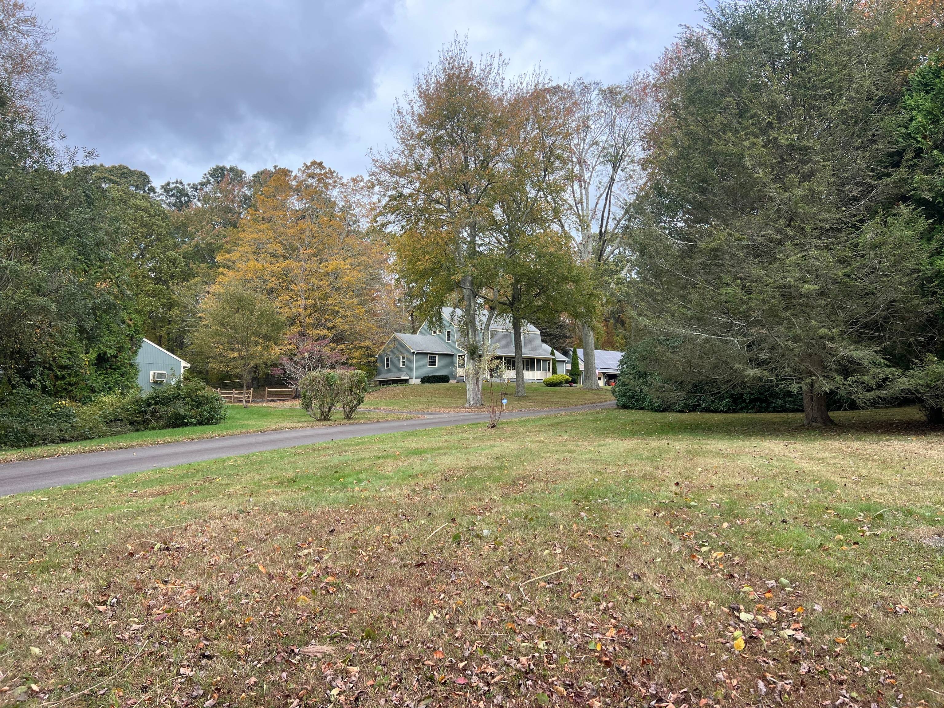 Discover the best of Connecticut shoreline living at 11 Trolley Crossing in Old Saybrook a private 3 acre compound blending classic Colonial architecture with modern luxury.