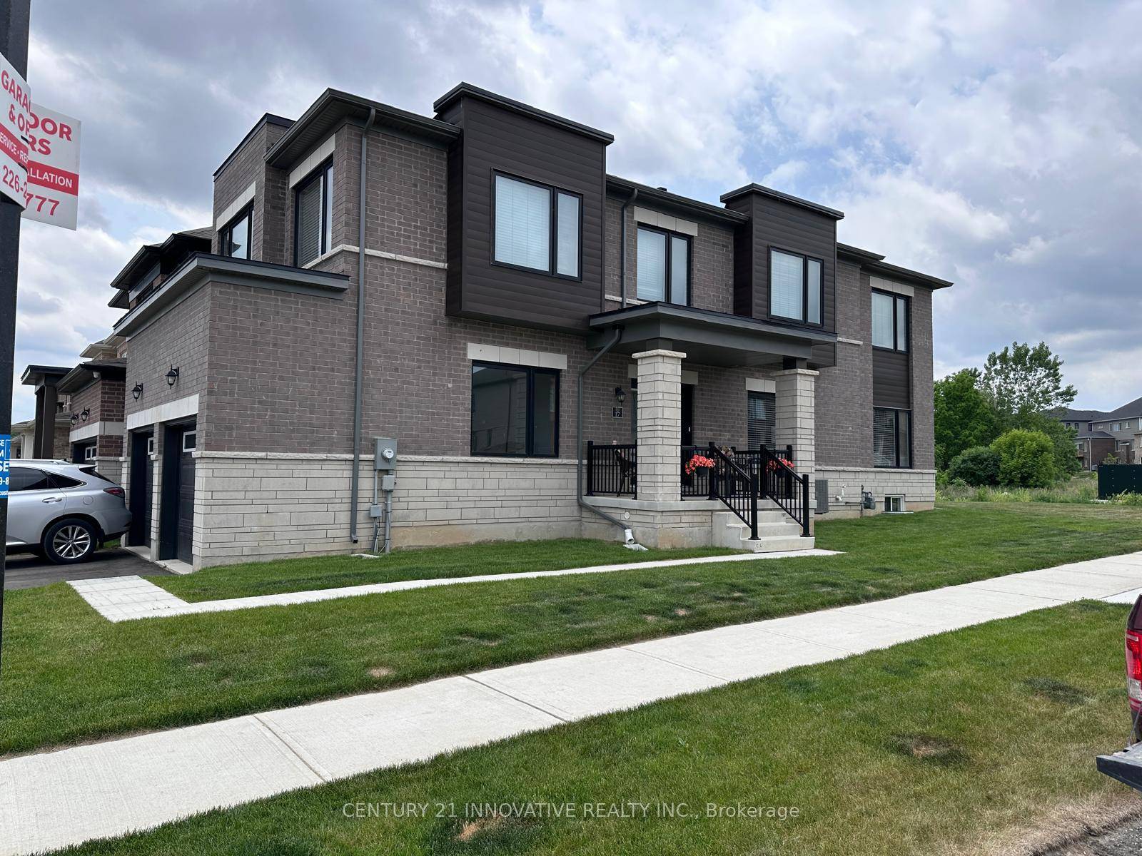Welcome to 17 Gilham Way, Paris, Ontarioa stunning brick and stone home situated on a premium corner lot with no rear construction.