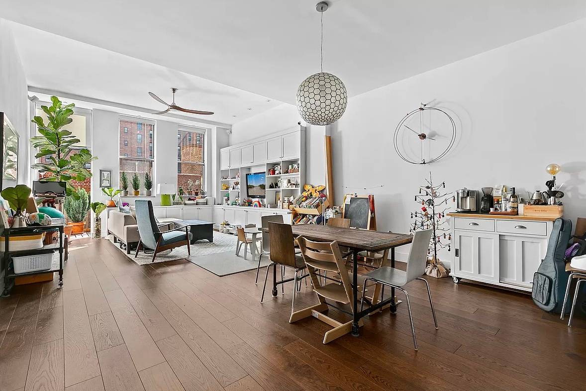 420 West 25th Street 4G offers a sleek and modern loft with three bedrooms and two full bathrooms.