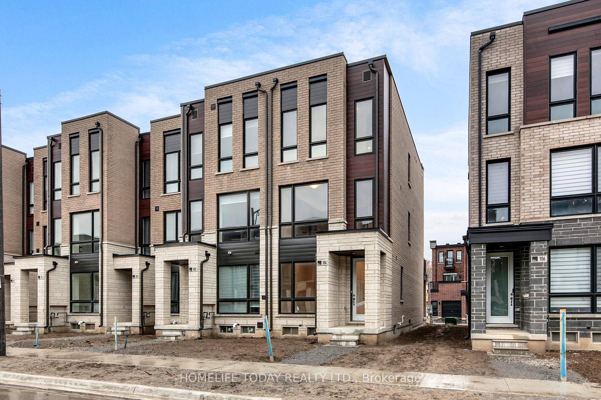 Modern END UNIT Townhouse by Primont Homes.
