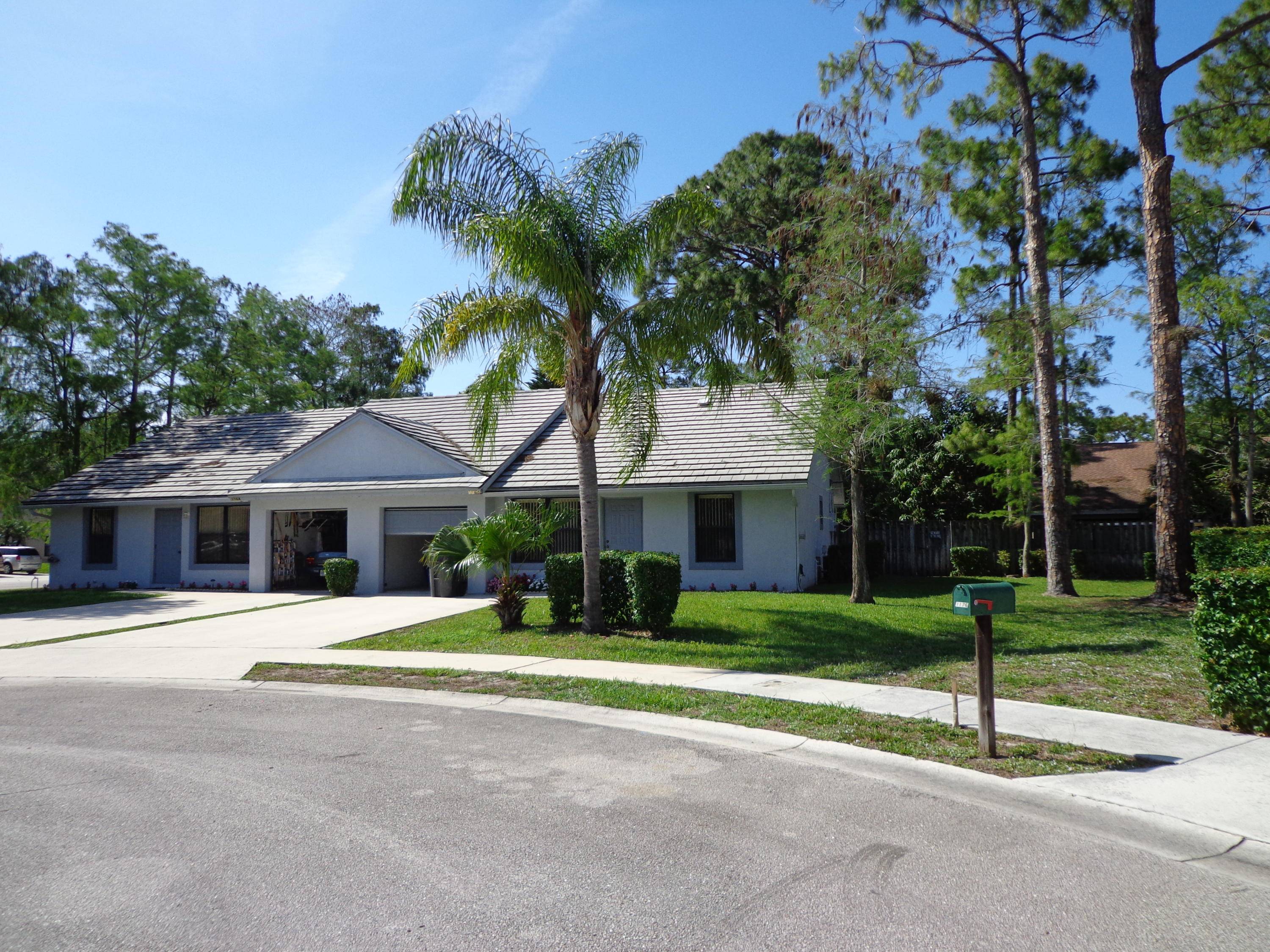 Nicely furnished unit with fenced yard and one car garage.