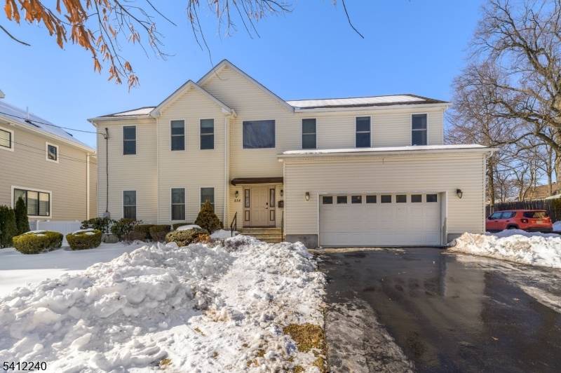 Custom built 2009 Colonial featuring quality construction, soaring ceilings, and a spacious, well designed layout.