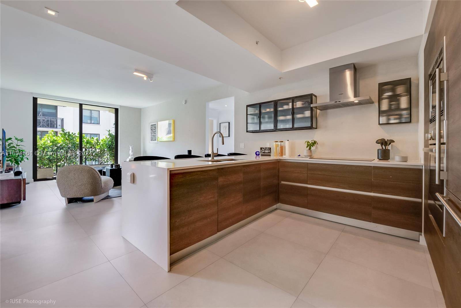 Experience the epitome of luxury living in this stunning 3 bedroom, 2 bathroom corner condo located in the highly sought after Merryck Manor in Miami.