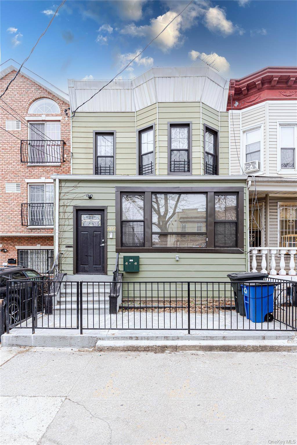 This lovely 2 family home was gut renovated in 2020 and includes high ceilings with light fixtures, a full finished basement and a private back yard.