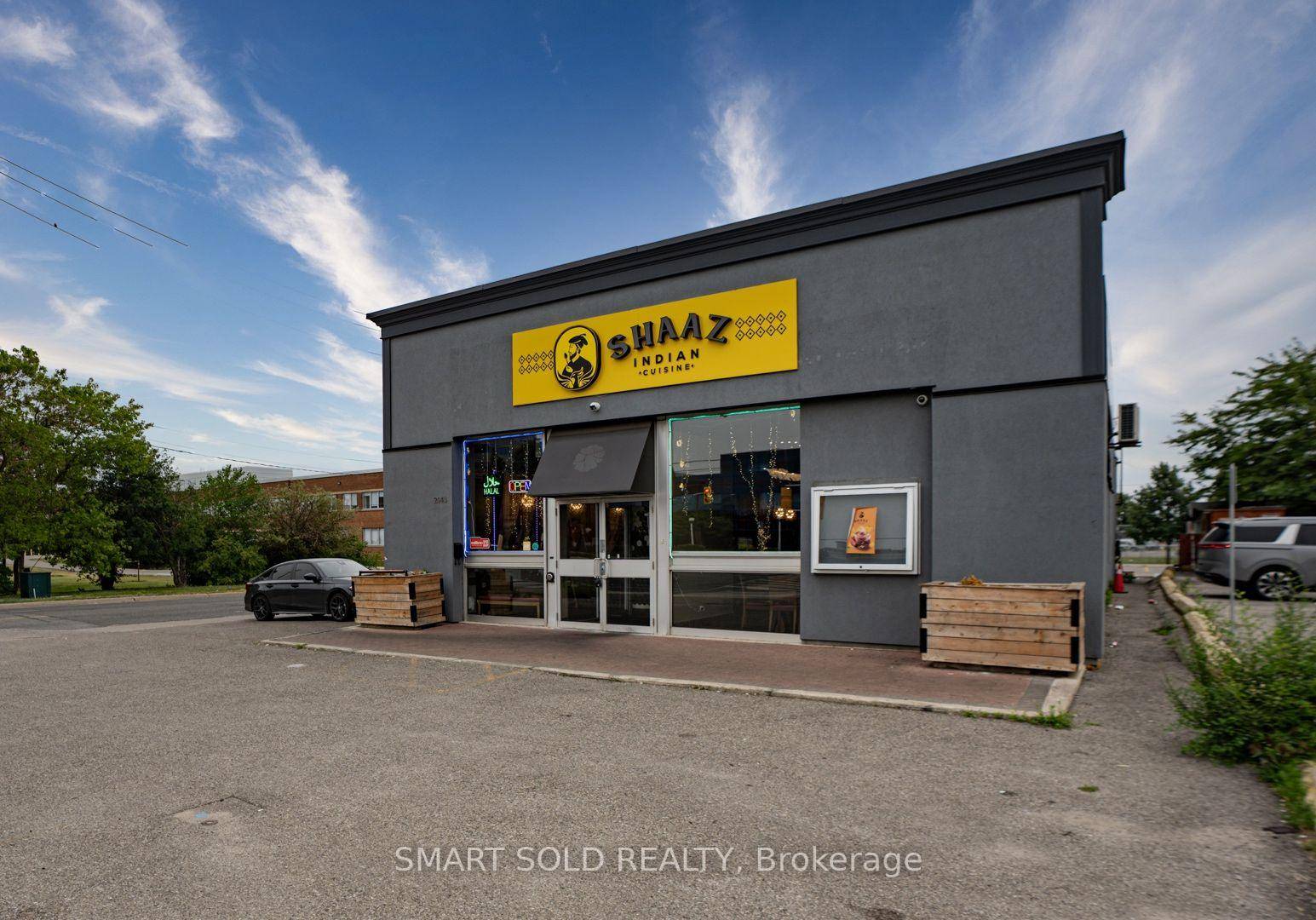 Exceptional Corner Lot Investment Opportunity In Toronto's Transforming Golden Mile !