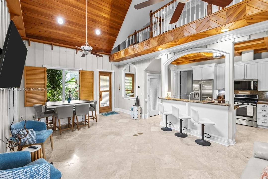 Discover this stunning 6 bedroom, 4 bath luxury villa in the highly sought after Old Hobe Sound community.