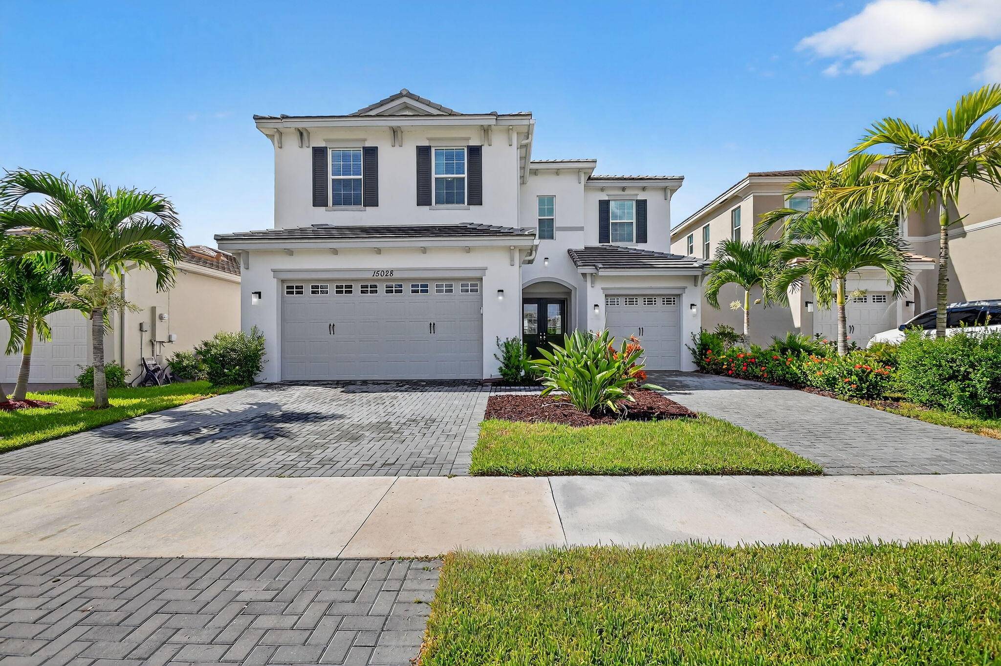 Welcome to the highly sought after Poinciana Model in the desirable Orchards community of Westlake !