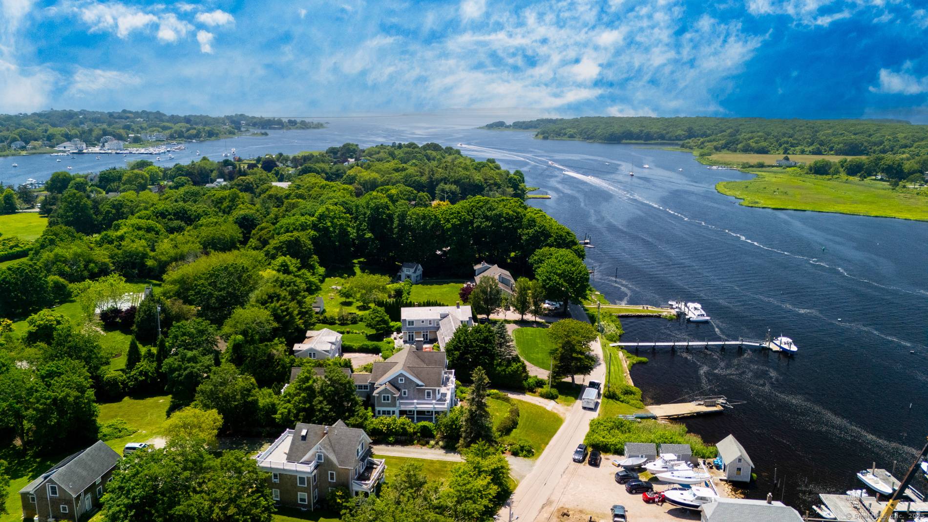 Set in the coveted summer community of Avondale just moments from the Village of Watch Hill, RI this custom built 2005 cedar shingle home offers stunning west facing views over ...