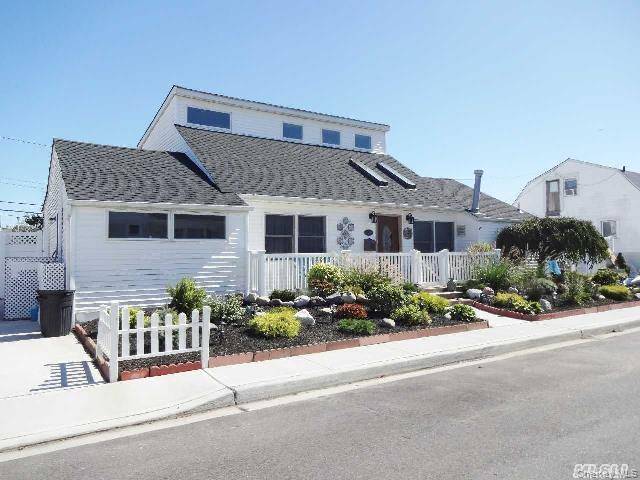 JULY 2026 WATERFRONT Spotless whole house one month summer rental WATERFRONT canal front with FLOATING dock and boat spot access to the open bay Kayaks included a quick bike ride ...