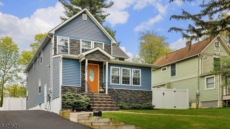 Welcome to this stunning, turn key colonial set on an expansive property in Fanwood.