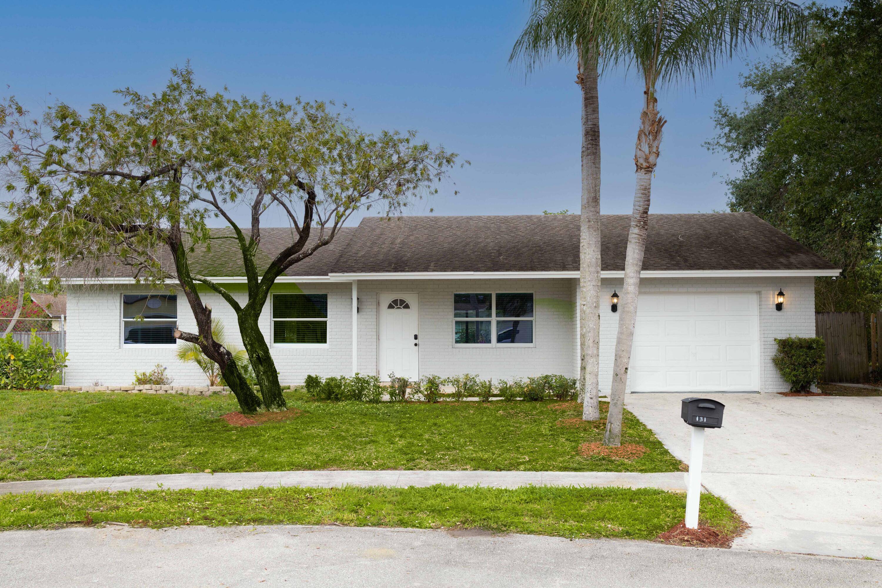 This home in The Willows, Royal Palm Beach, offers peace and serenity at every turn.