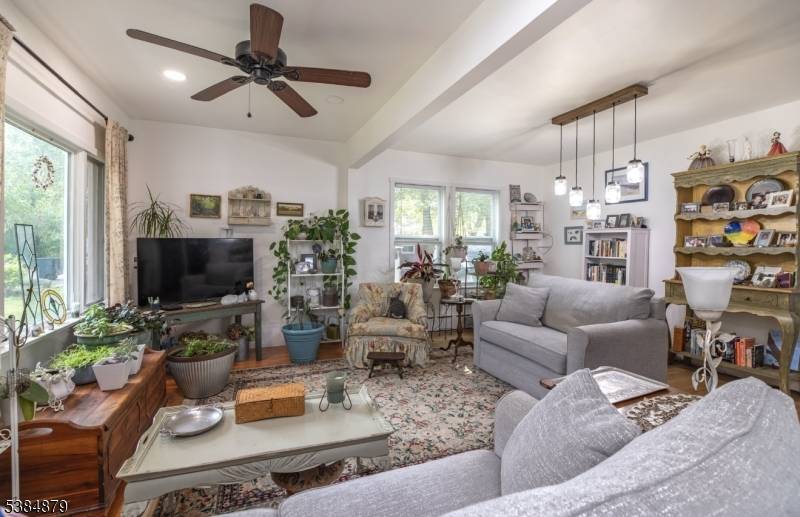 Location is everything ! This home is located less than a block from the beach in the highly sought after Erskine Lakes section of town.