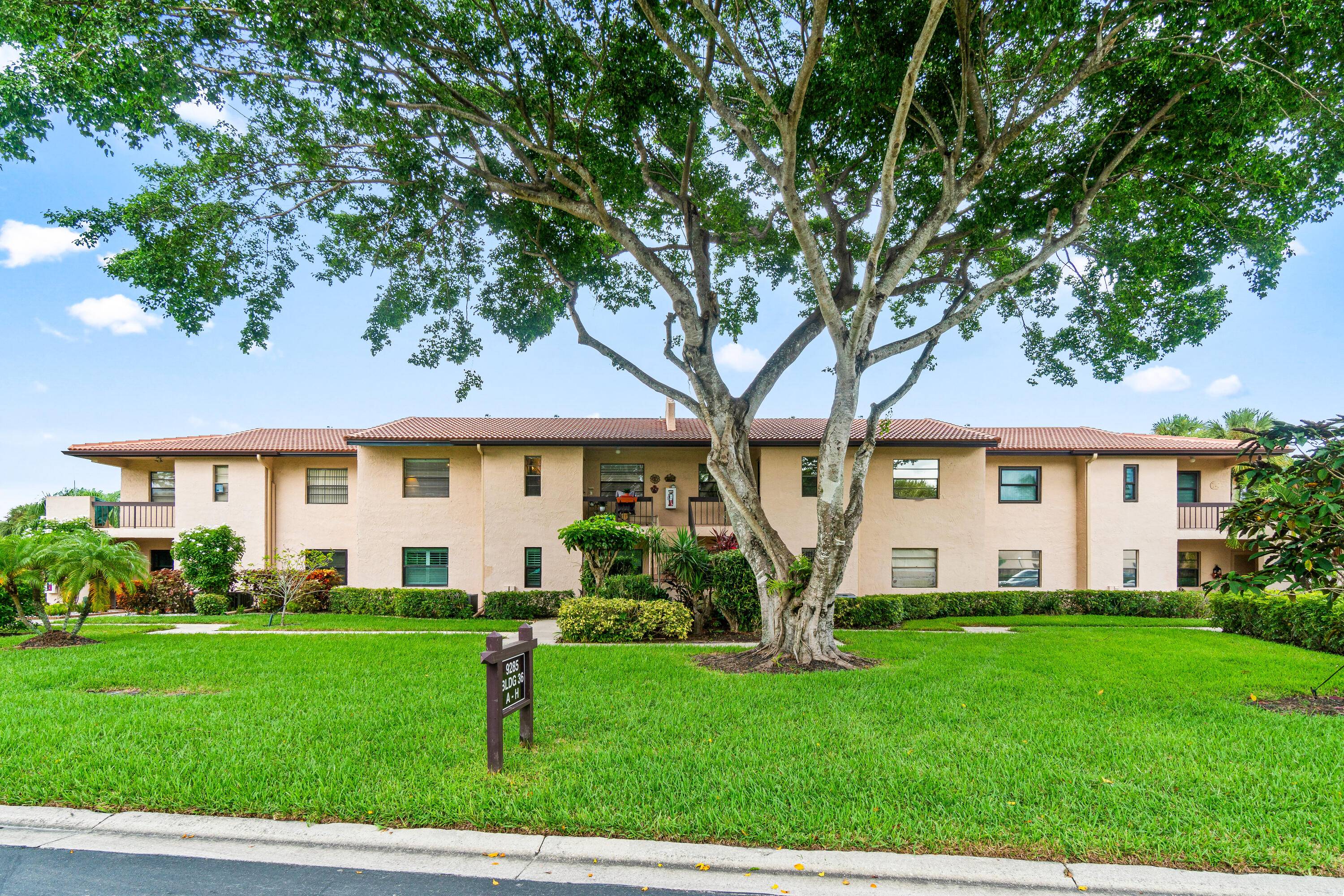 Welcome to boutique lakeside living in this exclusive 55 community of Boca Lago.