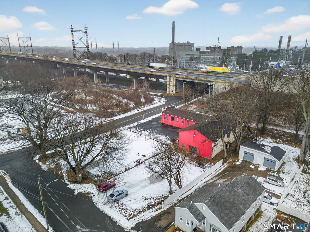 Convenient and well located commercial building plus the adjacent.