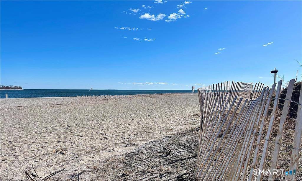 Here's your chance to live just steps from one of Connecticut's most beautiful sandy beaches, with stunning water views right across the street !