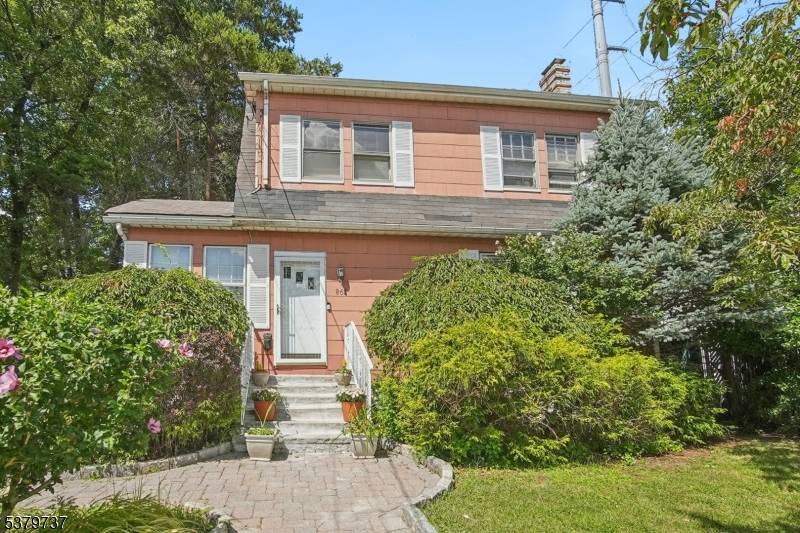 Nestled on an oversized double corner lot, this immaculate turnkey 4 bedroom, 2.