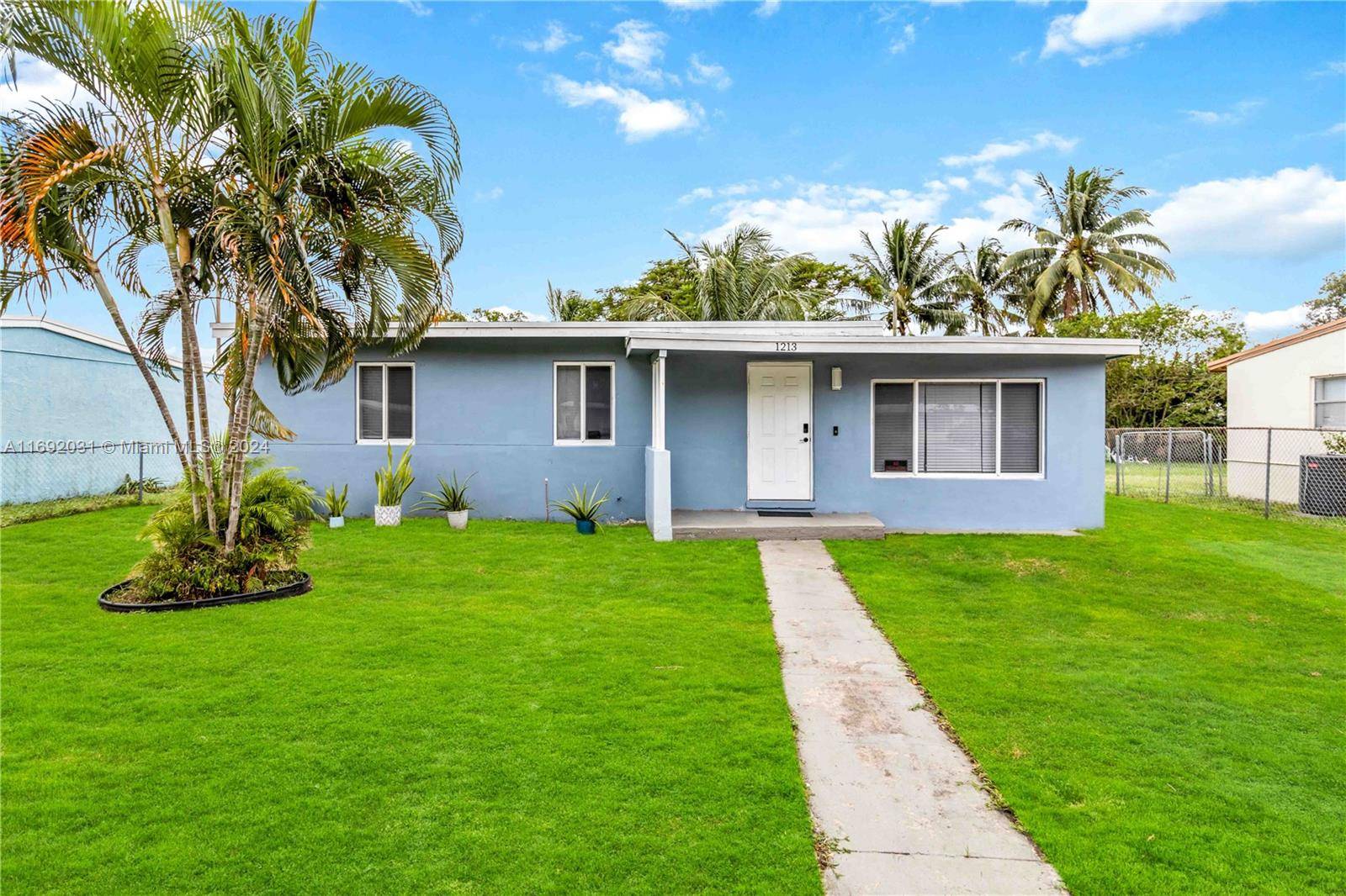 This charming 3 bedroom, 2 bath CBS home offers great curb appeal and features a brand new roof, impact windows and doors, and fresh interior and exterior paint.