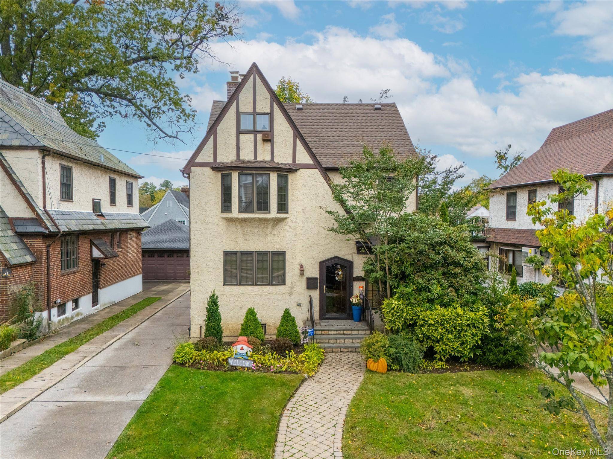 Discover this stately two and a half story brick single family residence, built in 1930 and set on a generous 4, 200 sq ft lot, in the heart of Bowne ...
