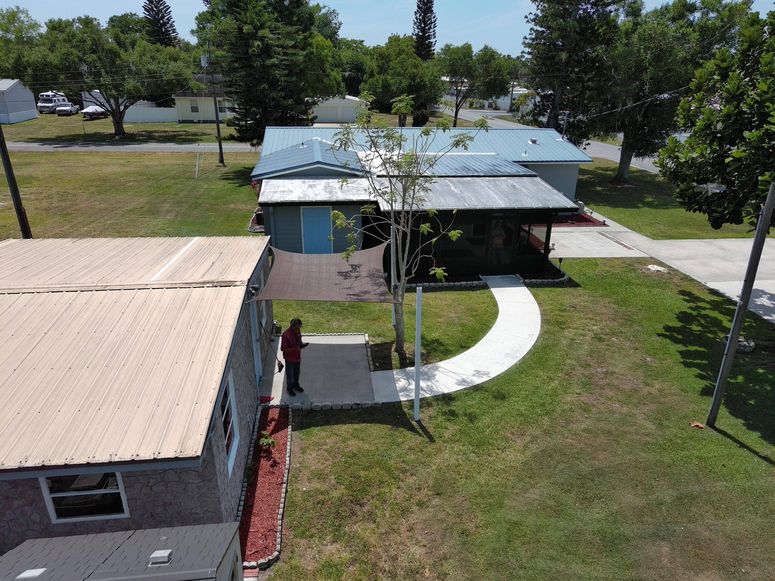 TWO CBS homes on one expansive 1 4 acre prime location corner lot.
