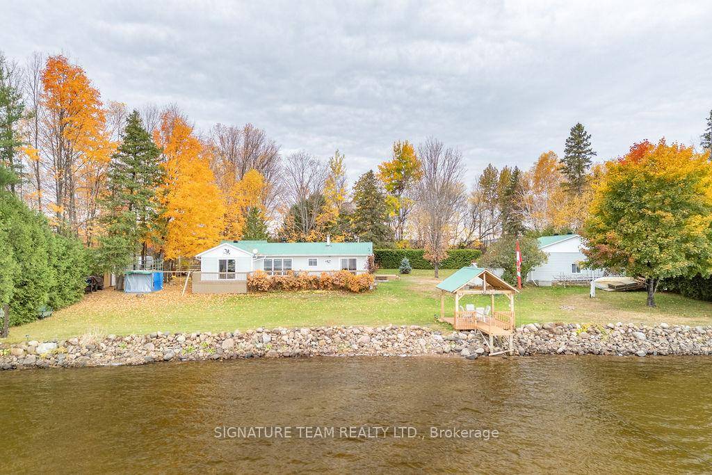 Spectacular year around home on Golden Lake with incredible eastern views over the lake with a beautiful backdrop of the hills in the distance.