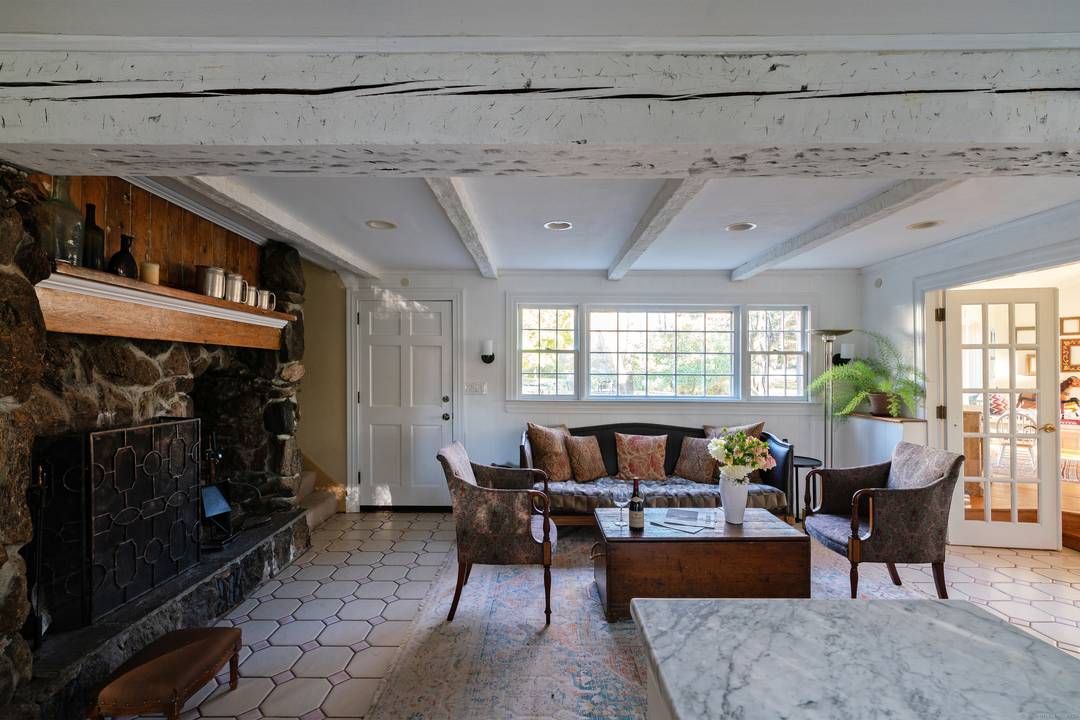 Strawberry Ridge Chalet is nestled between pristine vineyards overlooking Lake Waramaug.