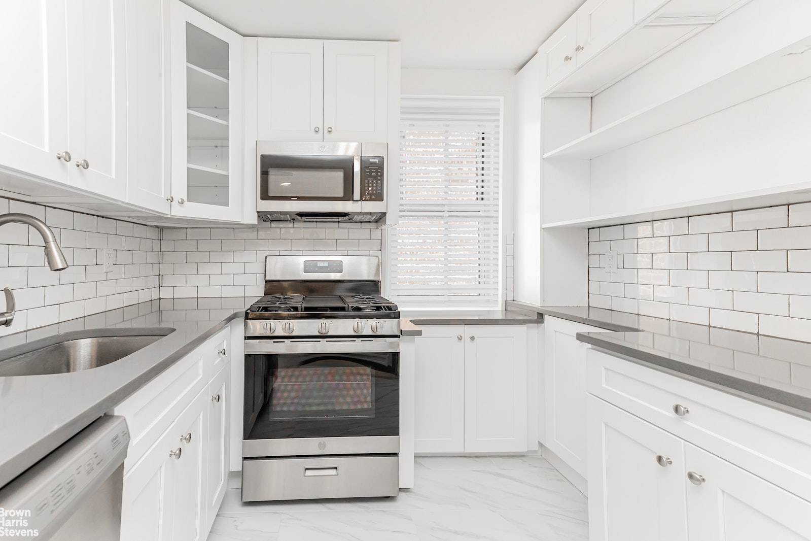 This stunning two bedroom unit has been architecturally renovated to today's standards.