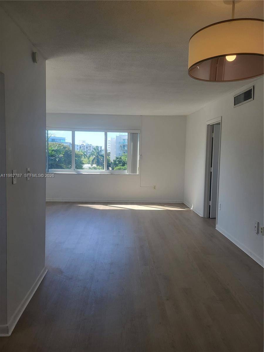 Top floor corner apartment with lots of light and new impact windows.