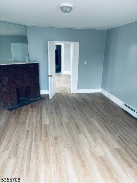 Welcome to this beautifully fully renovated 2 family home, offering exceptional space, modern updates, and incredible versatility.