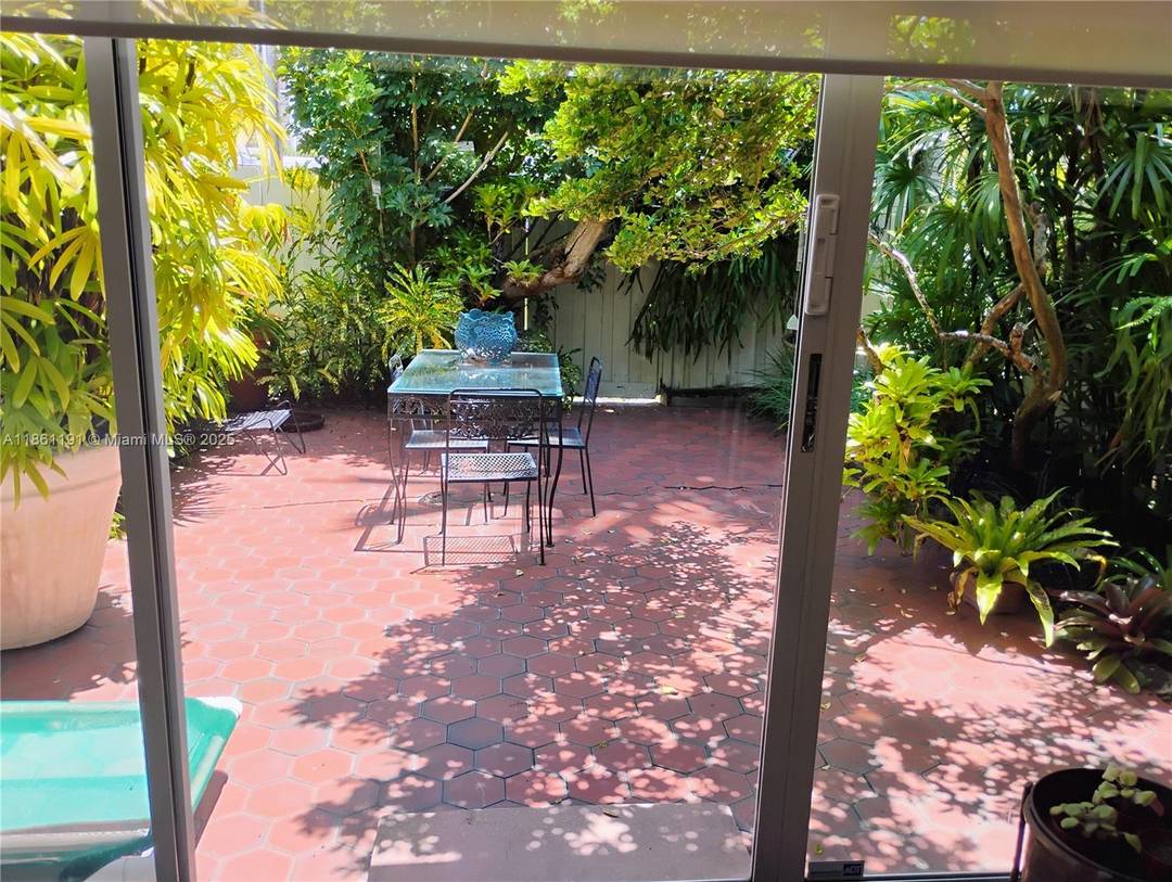 Discover the Best of South Florida Living in Desirable Three Island Venetian Park East !