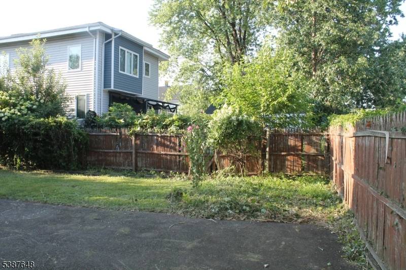 Welcome to a rare find in the heart of Little Ferry a charming and versatile two family home offering strong investment potential.