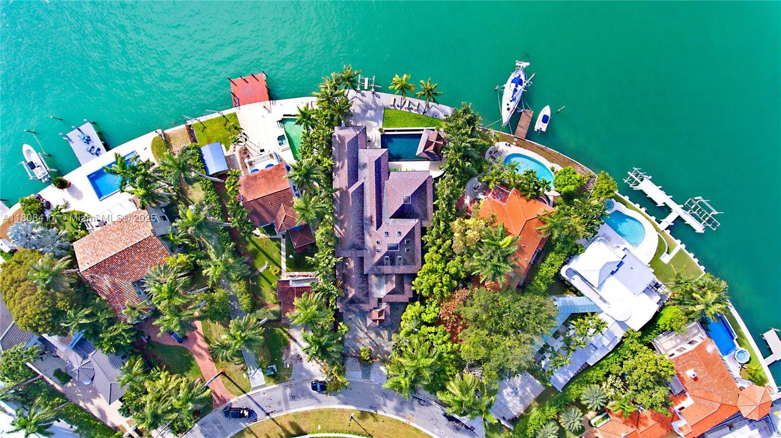 Nestled on the prestigious Venetian Islands, this Balinese inspired sanctuary offers highly coveted SW facing sunset views over downtown Miami's skyline with over 100 feet of water frontage on pie ...