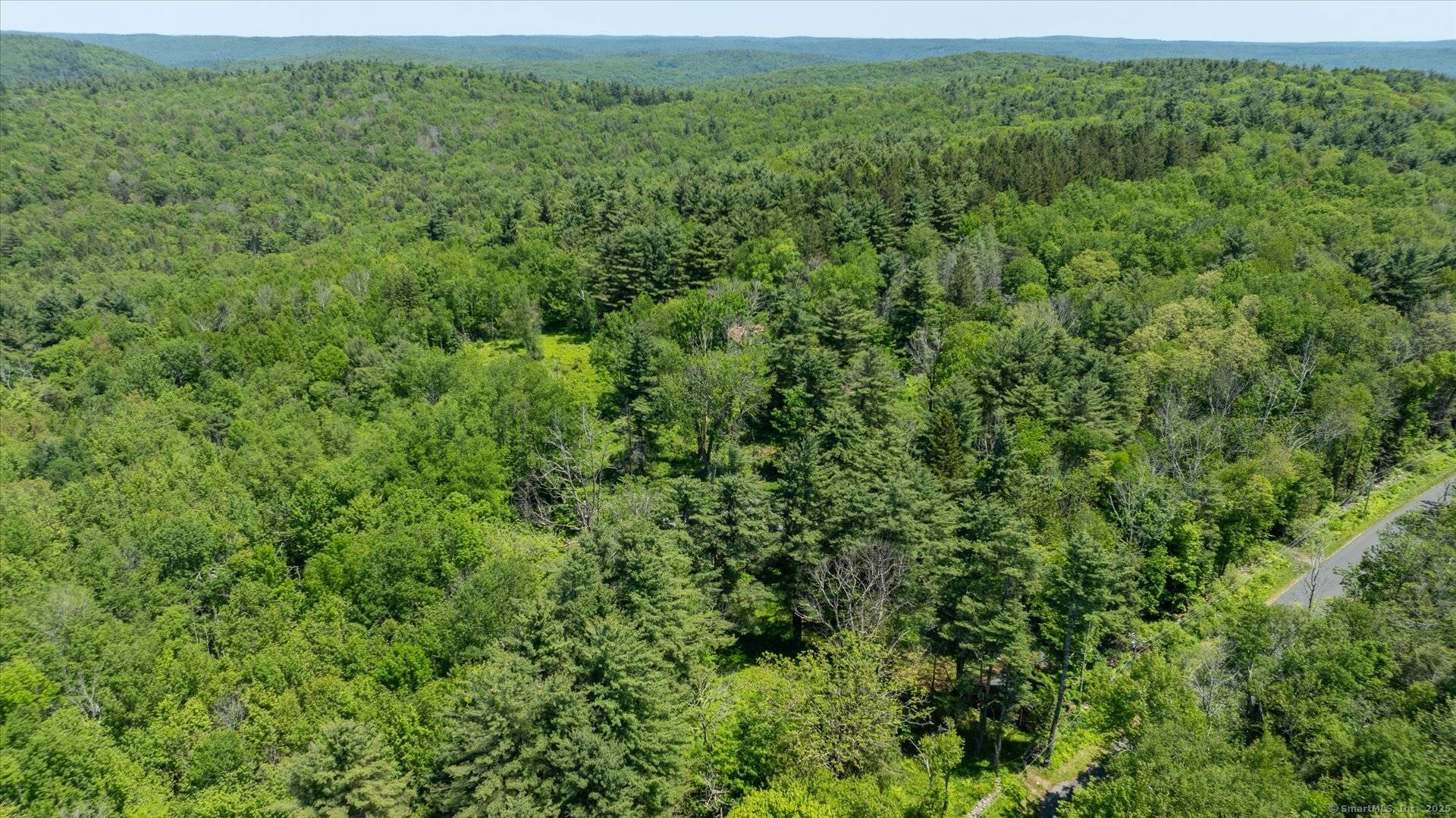 A rare opportunity to create your own private retreat in the peaceful foothills of Colebrook.