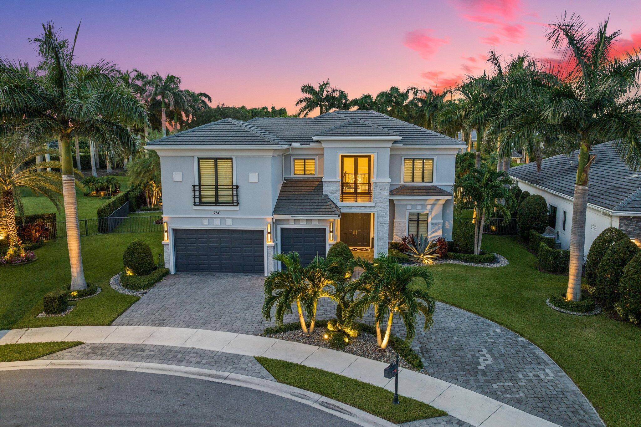 Introducing the Callahan Model on a rare XL pie shaped 17, 468sf lot in Royal Palm Polo.